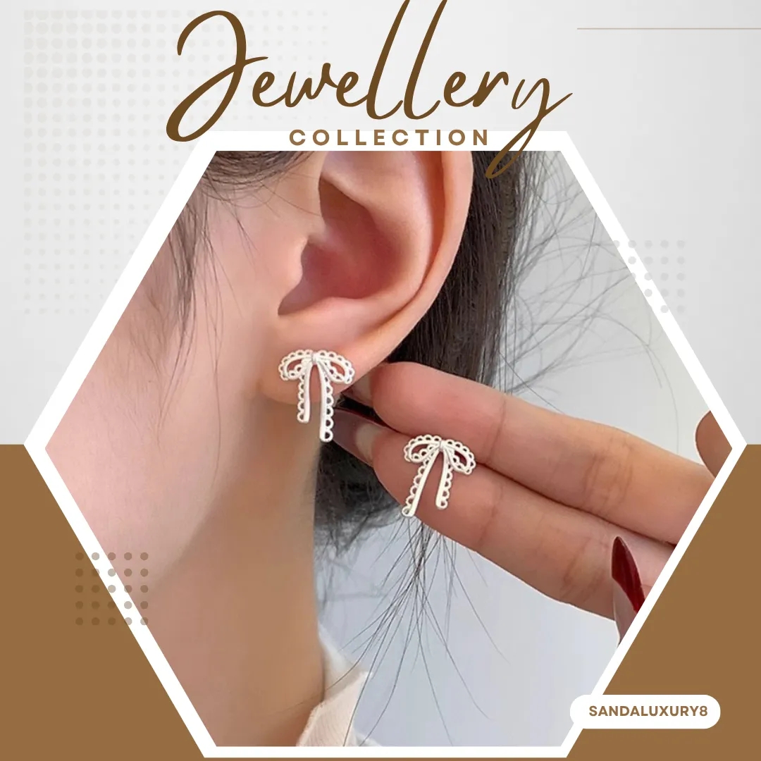 Cute Silver Bow Earrings - image 1