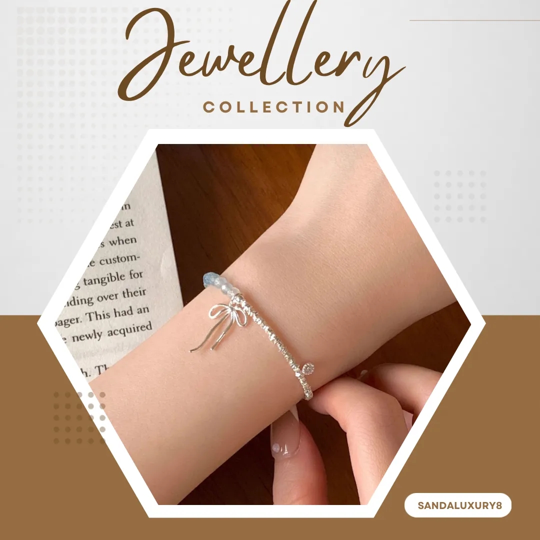 Silver Bracelet with Blue Beads and Bow Charm - image 1