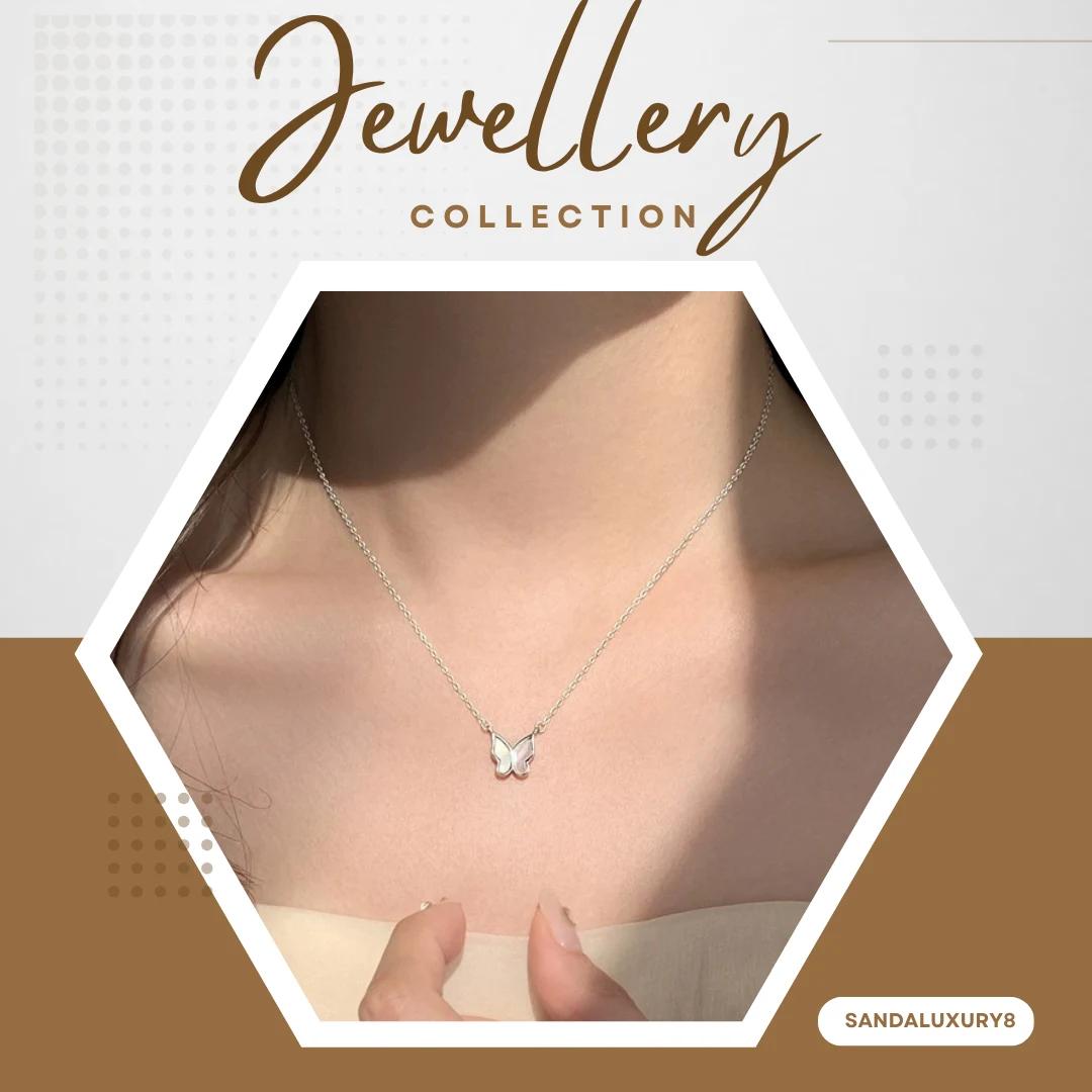 Silver Butterfly Necklace with White Shell Pendant